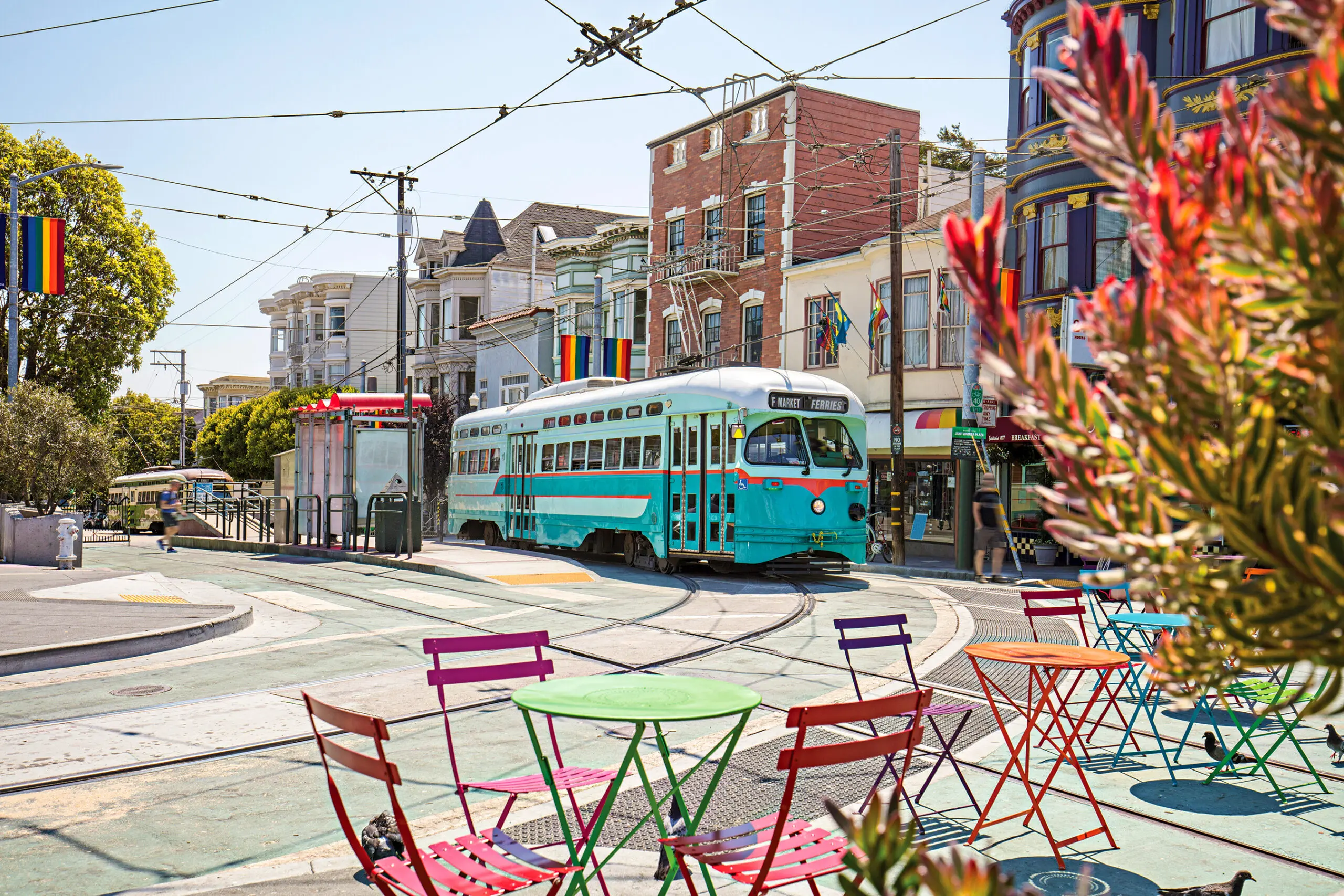 Castro Streetcar with Rainbow Flags in the streets of San Francisco